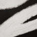 Close-up of bold white brushstrokes on black Carife abstract artwork