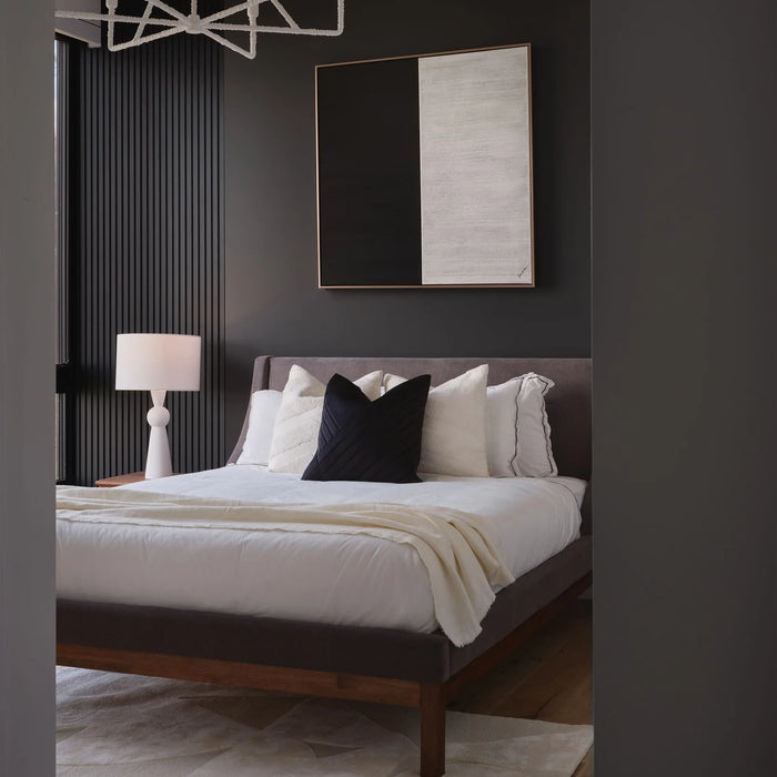 Renwil Gobi black and white canvas art displayed vertically in a modern bedroom