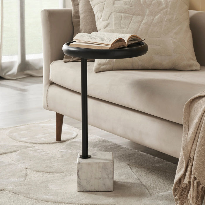 Renwil Hull accent table styled beside a sofa in a modern living room interior
