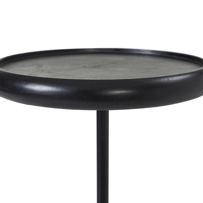 Side profile of Renwil Hull black accent table with slim iron stem