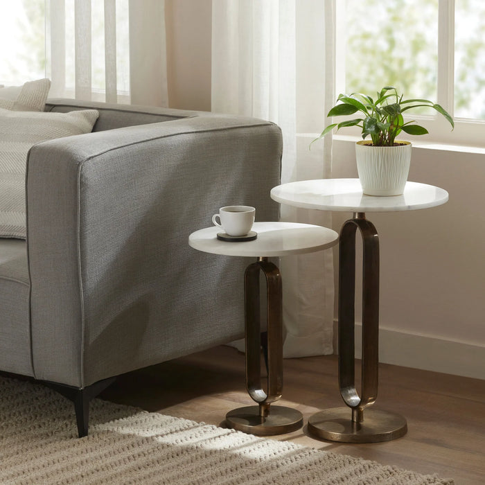 Renwil Irene nesting side tables styled beside a sofa in a modern living room