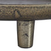 Close-up of the Kaleido tray’s textured antique brass finish and metal leg