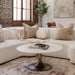 Renwil Lovisa round marble coffee table styled in a luxury living room with neutral décor