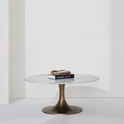 Renwil Lovisa marble coffee table styled in a minimalist contemporary studio setting