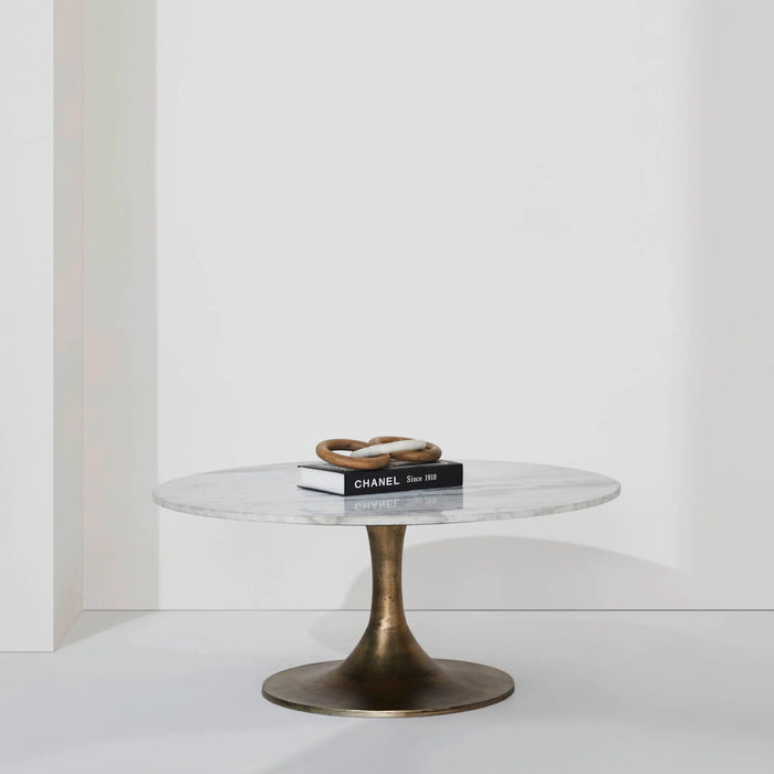 Renwil Lovisa marble coffee table styled in a minimalist contemporary studio setting