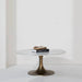 Renwil Lovisa marble coffee table styled in a minimalist contemporary studio setting