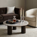 Renwil Lucente beige marble coffee table styled in a contemporary living room