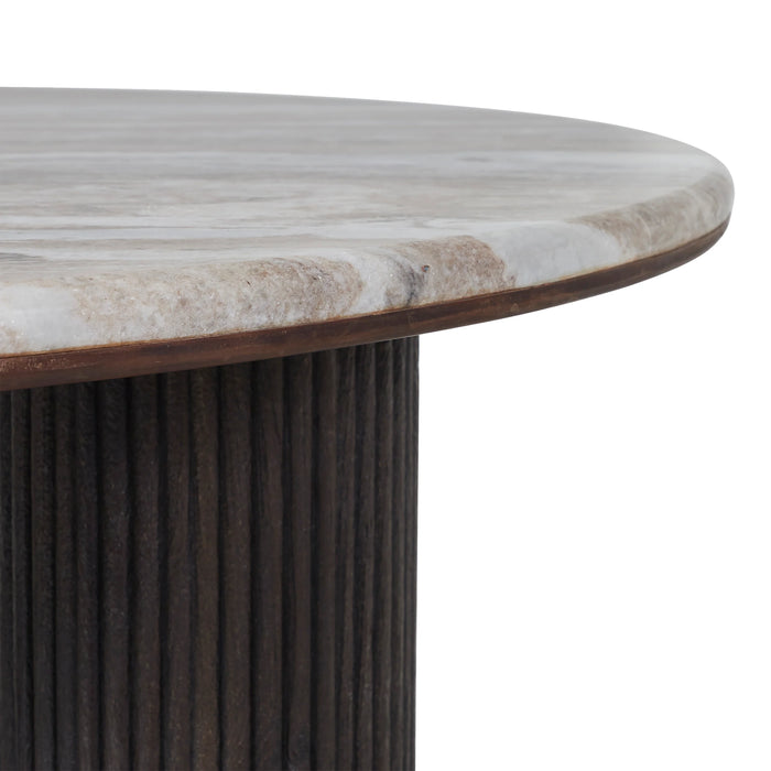 Close-up of the Lucente coffee table natural beige marble edge and walnut leg