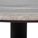 Detail view of the Lucente beige marble tabletop and dark walnut fluted leg