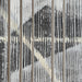 Close-up of black, white, grey and blue textured brushwork on Renwil Lyon wall art