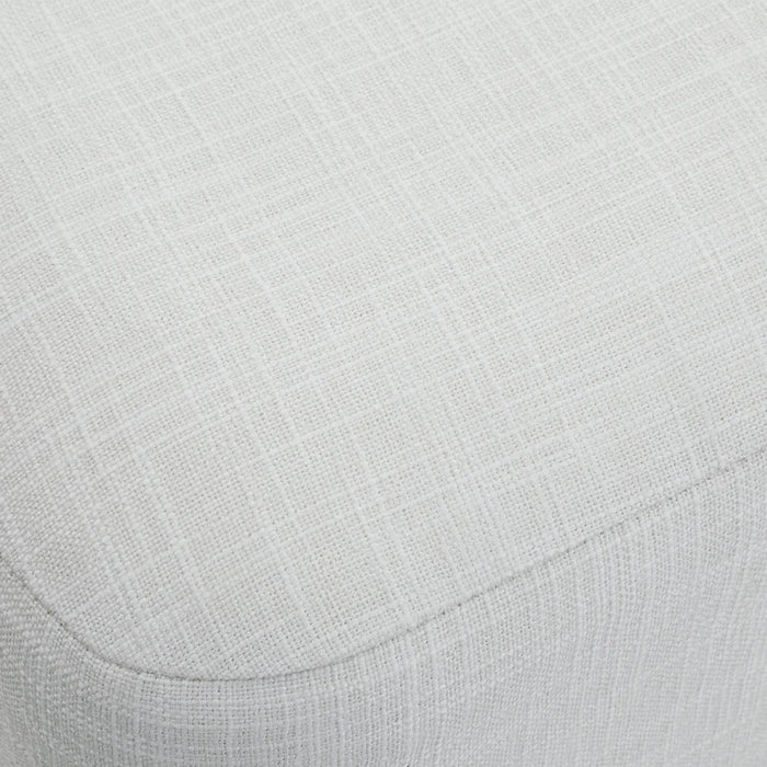 Close-up of the Meline accent stool textured ivory cotton tweed upholstery