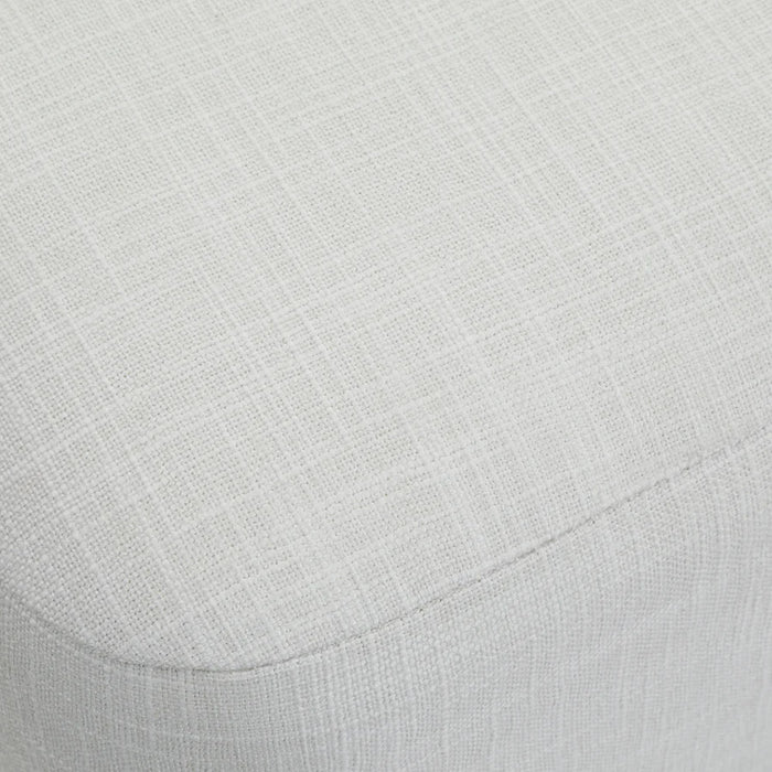 Close-up of the Meline bench textured ivory cotton tweed upholstery