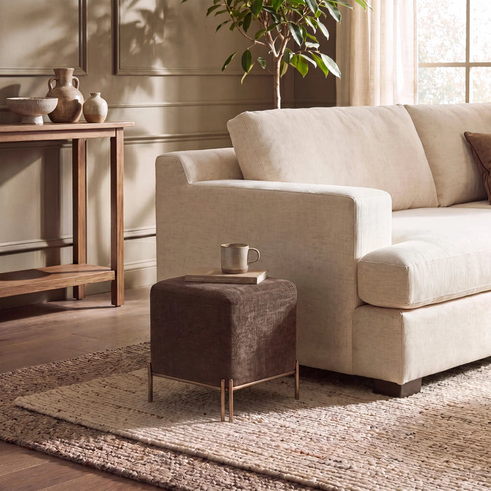 Renwil Meline brown linen accent stool styled beside a living room chair