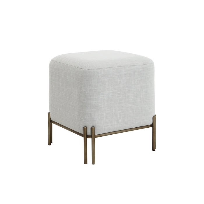 Angled view of Renwil Meline ivory cotton tweed accent stool with antique brass base