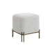 Angled view of Renwil Meline ivory cotton tweed accent stool with antique brass base