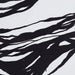 Close-up of the flowing black line details on the Renwil Mica abstract rag paper print