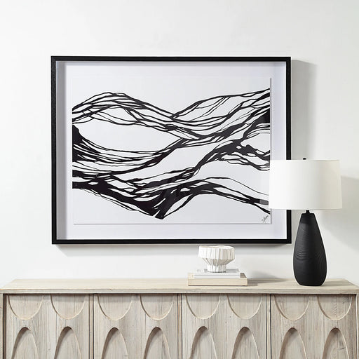 Renwil Mica black and white abstract wall art displayed above a contemporary console table