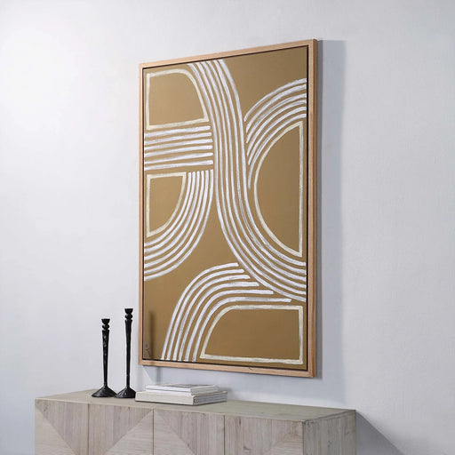 Renwil Milestone gold geometric canvas art displayed vertically above a modern console