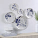 Renwil Narine blue and white porcelain wall plates displayed above a modern console table