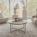 Renwil Pearse coffee table placed in a bright modern living room with soft natural lighting
