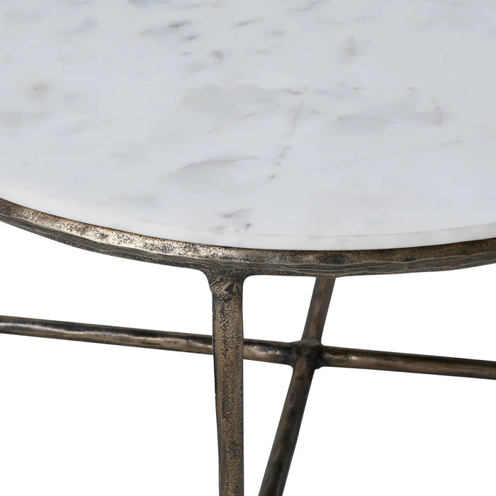 Close-up detail of the marble-look tabletop and antique brass frame on the Renwil Pearse coffee table