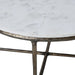 Close-up detail of the marble-look tabletop and antique brass frame on the Renwil Pearse coffee table