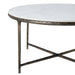 Side profile of the Renwil Pearse round coffee table with antique brass legs