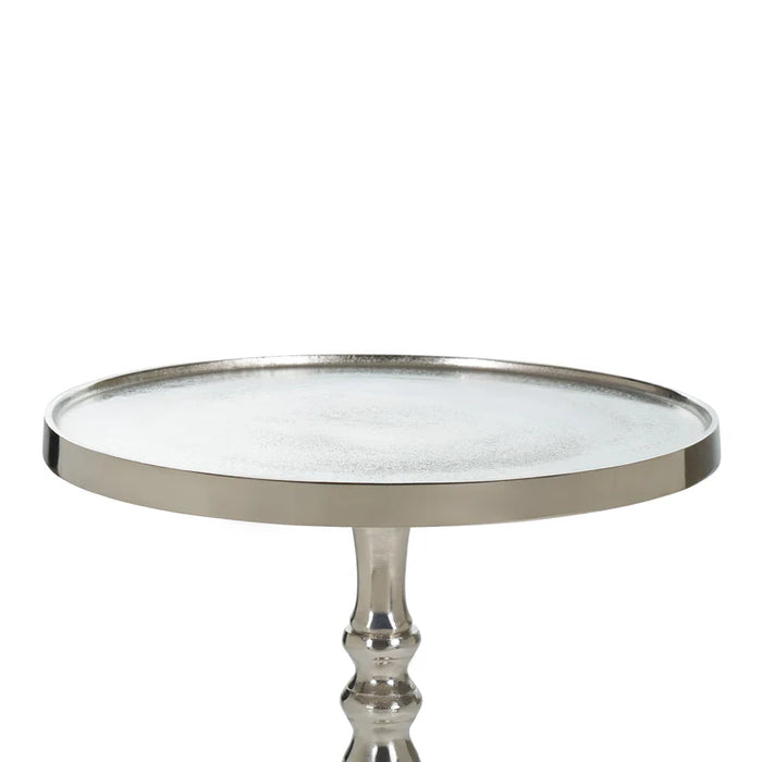 Top angled view of Renwil Romina aluminum accent table in raw nickel finish