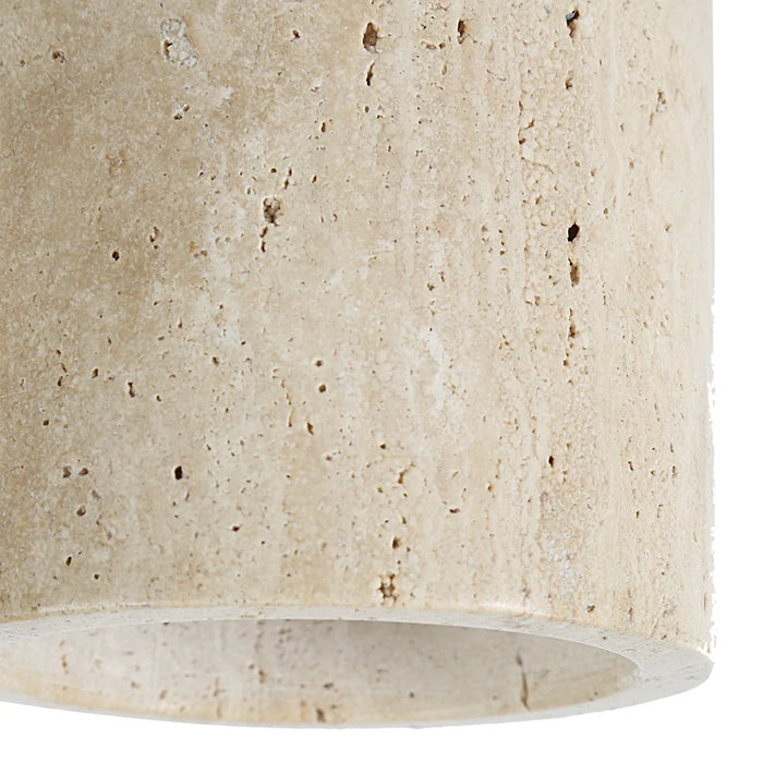 Close-up of the natural texture and variation of the Umberto travertine shade