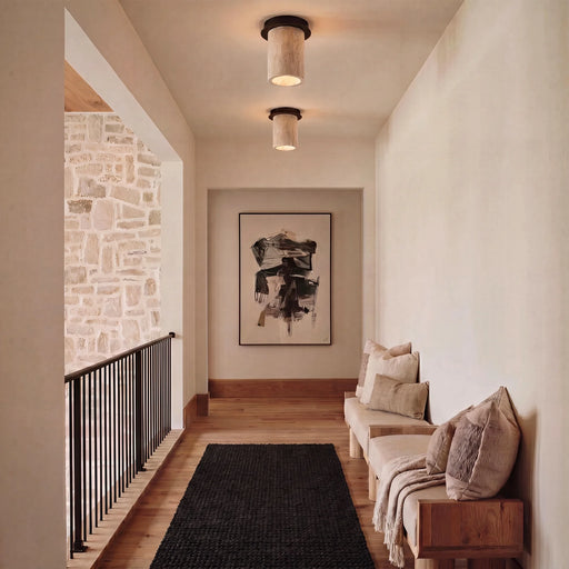 Renwil Umberto travertine ceiling lights installed along a warm contemporary hallway