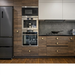 Richelieu 2065 cabinet knob set of 2 installed on modern wood kitchen cabinets
