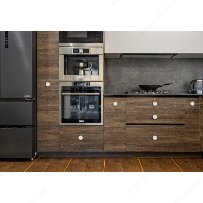 Richelieu 2065 cabinet knob sets installed on modern wood cabinetry