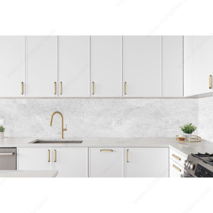 Richelieu 5465 hexagon cabinet pull installed in a bright modern kitchen
