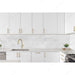 Richelieu 5465 hexagon cabinet pull installed in a bright modern kitchen