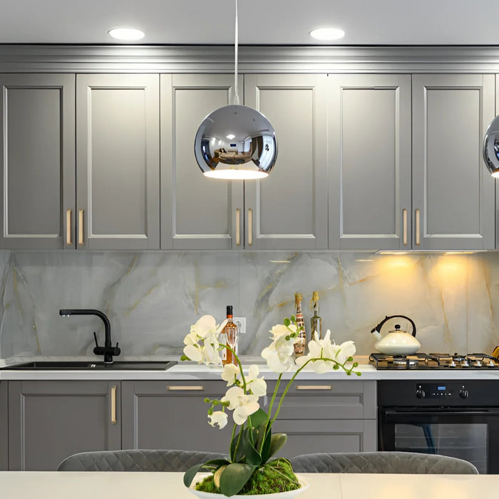 Richelieu 5465 hexagon cabinet pull installed on contemporary kitchen cabinets