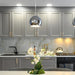 Richelieu 5465 hexagon cabinet pull installed on contemporary kitchen cabinets