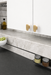Richelieu 7345 cabinet knob installed on modern kitchen cabinetry