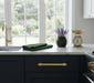 Richelieu 8715 geometric cabinet pull installed in a modern kitchen