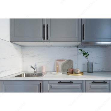 Richelieu 8747 modern metal pull in matte black  installed in a modern kitchen