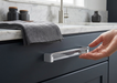 Richelieu 8778 acrylic cabinet pull installed on a modern vanity drawer