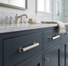 Richelieu 9730 fluted cabinet pull installed on a modern bathroom vanity