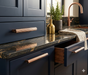 Richelieu 9730 fluted cabinet pull installed on modern kitchen cabinetry