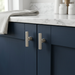 Richelieu 9730 fluted cabinet knob set of 2 in brushed nickel installed on blue kitchen cabinet