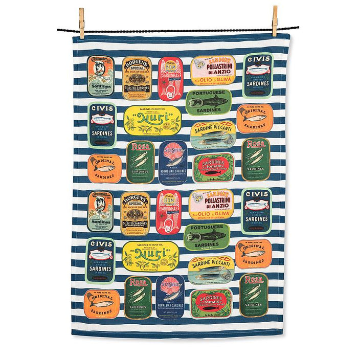 Sardine tins cotton kitchen towel featuring colorful vintage seafood labels on blue striped background