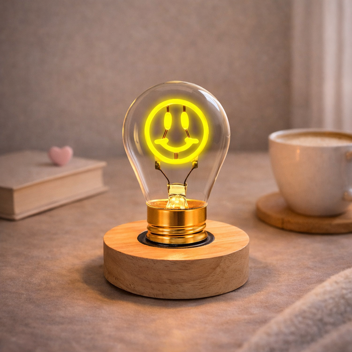 Smiley face neon LED light bulb on wooden base glowing in cozy room setting
