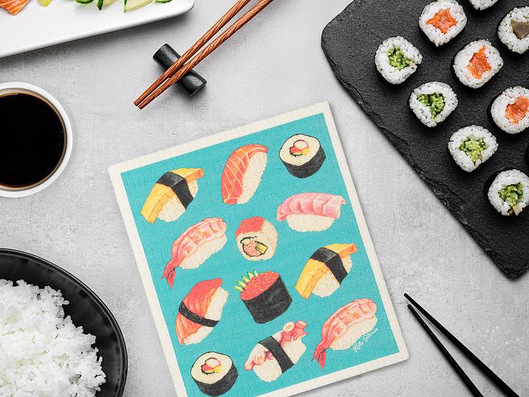 Swedish dishcloth with sushi design used in kitchen cleaning setting