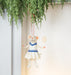 Tennis mouse ornament hanging decor in indoor setting