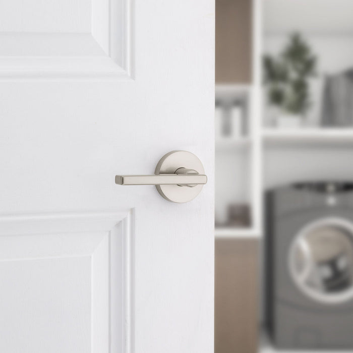 Weiser Halifax satin nickel hall closet door lever installed on interior door