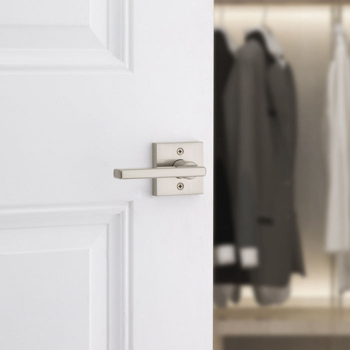Weiser Halifax satin nickel dummy lever installed on white interior door