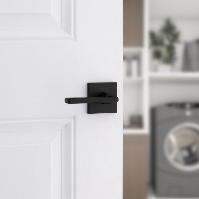 Weiser Halifax square lever handle installed on white interior door